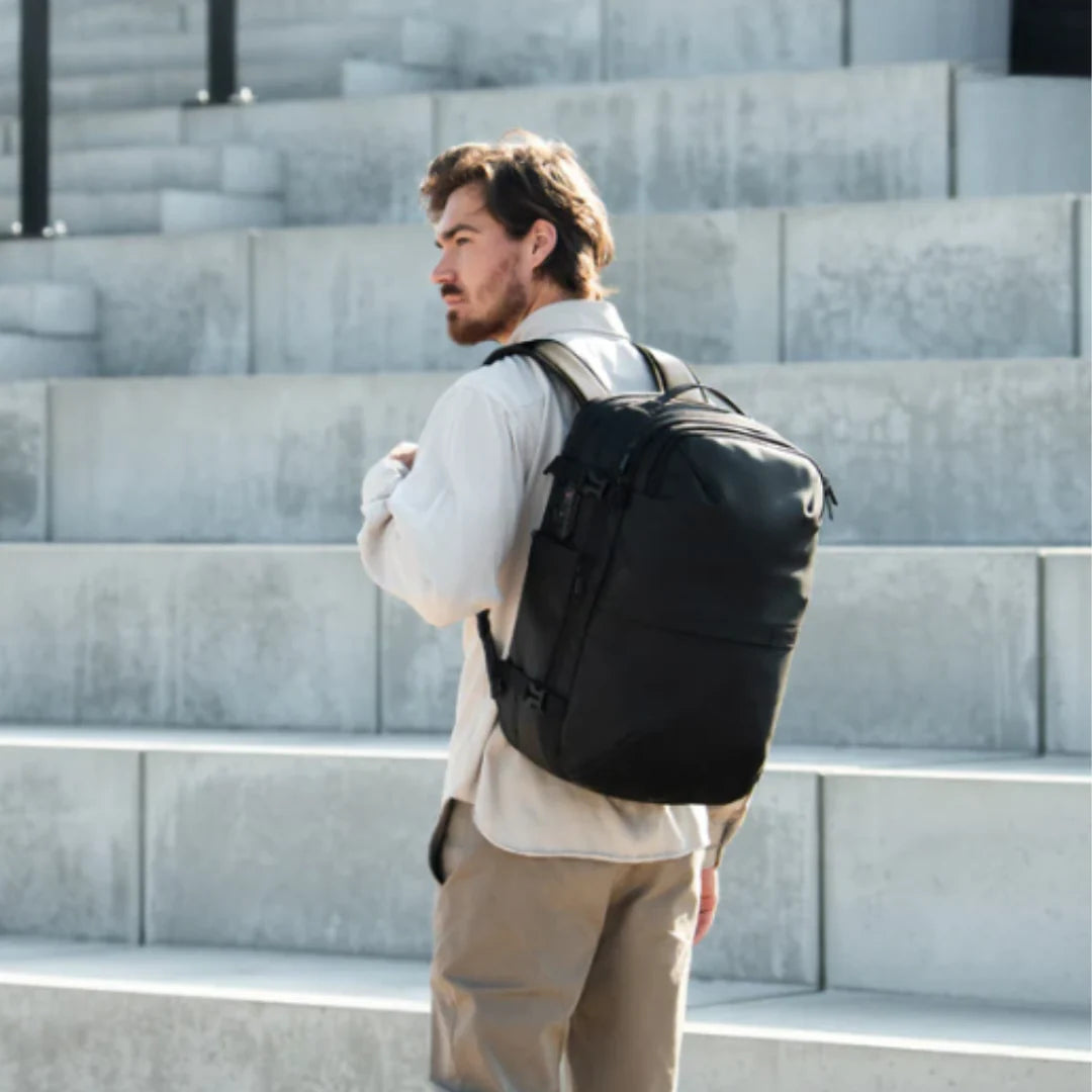 Traveler wearing an Air Pro backpack